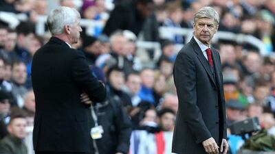 Arsenal manager Arsene Wenger, right, and Newcastle United manager Alan Pardew on the touchline during their Premier League match on Sunday at St James' Park. Jan Kruger / Getty Images