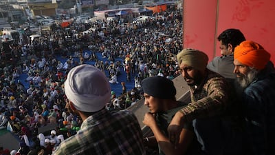 Farmers attend a protest during a nationwide strike against the newly passed farm bills at Singhu border near Delhi, India. Reuters