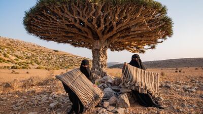 Shaikha and Adhab display the traditional carpets that were recorded in the 10th century as being one of the island’s major exports. Photo: Julian Jansen van Rensburg