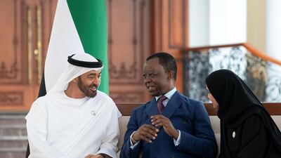 Sheikh Mohamed bin Zayed meets with Roger Nkodo Dang, president of the Pan-African Parliament, centre, and Dr Amal Abdullah Al Qubaisi, Speaker of the Federal National Council, right, during a Sea Palace barza. Ryan Carter / Ministry of Presidential Affairs