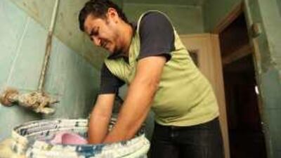For Hassan Sabit Mohammed, 24, making industrial soap is just one of four jobs.