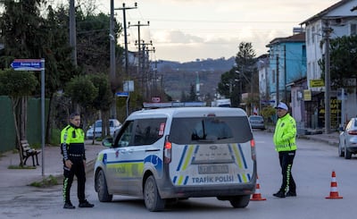 Police officers block a road leading to a site where Turkish police launched an operation on a house believed to contain suspected ISIS militants. Reuters