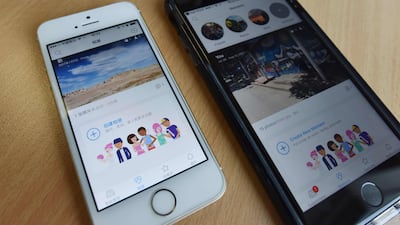 Facebook's Colorful Balloons app (L) next to its Moments app (R) at an office in Beijing. That may be as far as the firm gets in China for now. Greg Baker / AFP