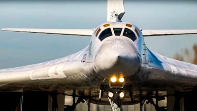 A long-range, nuclear-capable Tu-160 bomber of the Russian Aerospace Forces takes-off to patrol in Belarus from an air field in Russia. Russian Defence Ministry Press Service via AP