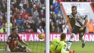 Tottenham's Harry Kane, right, fired three past Bournemouth goaltender Artur Boruc as the Spurs rolled to a 5-1 victory. Toby Melville / Reuters