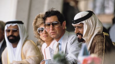 The Prince and Princess of Wales at a camel race near Al Ain during the March 1989 visit. Getty