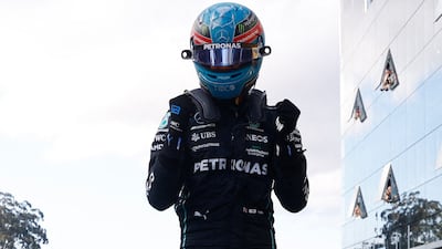 George Russell celebrates after finishing in pole position and winning the sprint race. Reuters