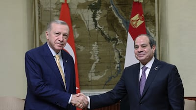 The two presidents shake hands. AP