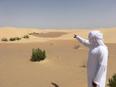 Omar Al Kaabi, from the Department of Culture and Tourism - Abu Dhabi, on the site of Hosn Al Sirra. Photo courtesy of Timothy Power