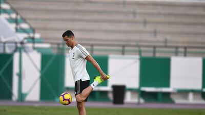 Cristiano Ronaldo warms up during the session. Getty Images