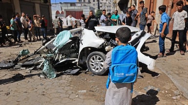 The wreckage of a car destroyed in an Israeli strike in Gaza city, despite a ceasefire being put in place a year ago. AFP