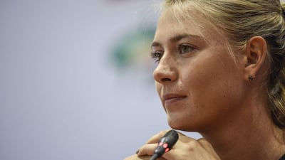 Maria Sharapova shown at a press conference on Saturday ahead of the WTA Wuhan Open. Fred Dufour / AFP / September 26, 2015