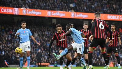 Manchester City's Jeremy Doku scores the opening goal. AFP