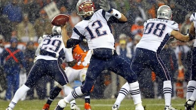 In this Nov. 29, 2015, file photo, New England Patriots quarterback Tom Brady (12) throws against the Denver Broncos during the first half of an NFL football game, in Denver. New England and Denver will play in the AFC Championship game on Sunday, Jan. 24, 2016, in Denver. (AP Photo/Jack Dempsey, File)