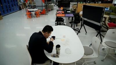 A professor of Pusan National University Park Hyun eats lunch while keeping social distancing in South Korea. Reuters