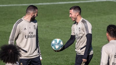 Real Madrid's Karim Benzema, left, and Eden Hazard during training at the Valdebebas sport city. EPA