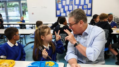 Mr Starmer visits Downs Primary School in Harlow to outline government plans to extend free school meals in June 2025. Getty Images