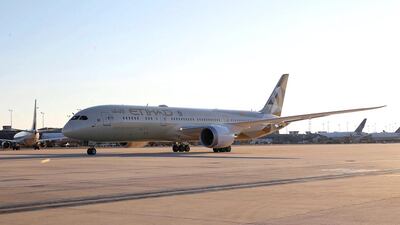 Etihad Airways’ Boeing 787 Dreamliner touches down at Dulles International Airport marking the Abu Dhabi carrier’s inaugural service to Washington DC. Paul Morigi / Getty Images for Etihad