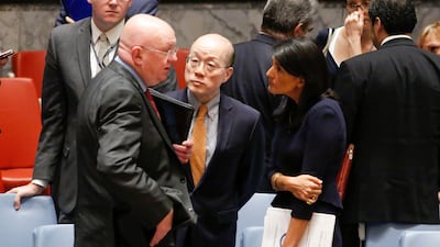The Russian ambassador to the UN Vasilly Nebenzia, left, speaks with US ambassador Nikki Haley and Chinese ambassador Liu Jieyi after a UN Security Council meeting. AFP