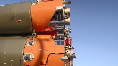 The huge boosters of the Soyuz-FG are seen up close as a train carries it towards the launch pad. James Langton / The National