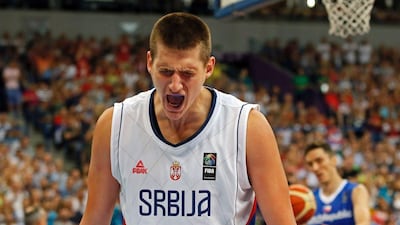 Serbia's Nikola Jokic reacts after scoring during the Fiba Olympic Qualifying semi-final win over Czech Republic. Pedja Milosavljevic / AFP / July 8, 2016