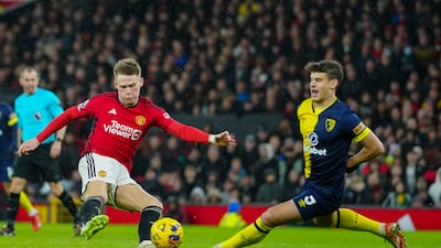 Bournemouth's Milos Kerkez attempts to block a shot from Scott McTominay of Manchester United. AP