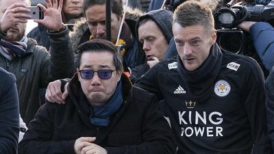 Leicester City striker Jamie Vardy stands with Aiyawatt Srivaddhanaprabha, the son of the club's owner Vichai Srivaddhanaprabha. Getty Images