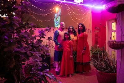 Vipin Gupta, with his wife, Charu, and two daughters, Divyanshi and Kunnjal. Reem Mohammed / The National