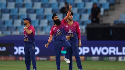 UAE spinner Simranjeet Singh celebrates the prized wicket of Pakistan's Fakhar Zaman