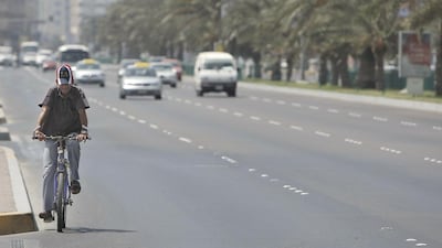 Readers call for an extensive networks of bike lanes to ensure riders’ safety. Ryan Carter / The National