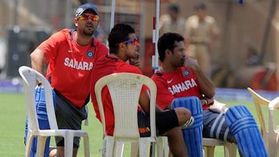 Yuvraj Singh, left, and Sachin Tendulkar, right, know what it is like to be adulated one moment and vilified another. Along with Zaheer Khan, not pictured, they hope to be heroes for India once again.