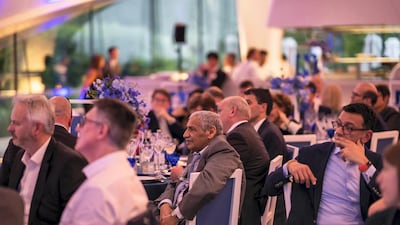 The audience listens to a speech.