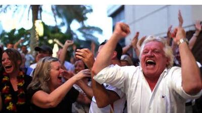 The highs: Karl Dovfler celebrates at Brauhaus as Germany score their fourth goal.