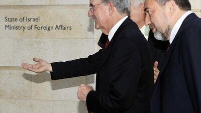 George Mitchell, left, the US special envoy to the Middle East, with Avigdor Lieberman, right, Israeli foreign minister, in Jerusalem yesterday.