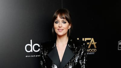 Dakota Johnson in a Saint Laurent jumpsuit at the 23rd annual Hollywood Film Awards at the Beverly Hilton hotel in LA. Reuters