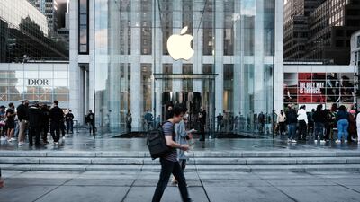 People shopping at the Fifth Avenue Apple Store during the launch of Apple’s new iPhone 13 and iPhone 13 Mini in September in New York. Getty