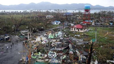 Houses destroyed by Super Typhoon Haiyan at Tacloban on the eastern island of Leyte in the Philippines. The storm tore into the islands of Leyte and Samar on Friday. AFP Photo / Noel Celis
