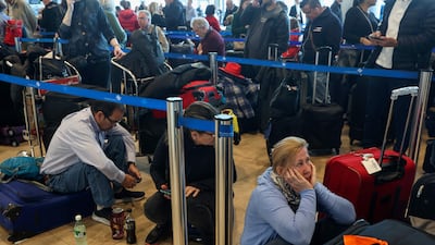 Passengers wait for their flights during a strike at the Ben Gurion International Airport near Tel Aviv. AFP