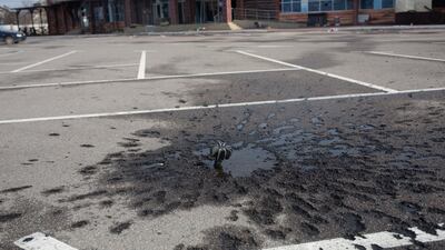 An unexploded mine in a shopping centre car park in Stoyanka. Getty Images