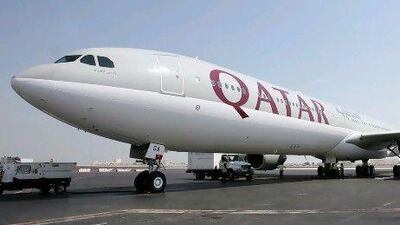 Willie Walsh, the chief executive of International Airlines Group which owns British Airways and Iberia, expects Qatar Airways to sign up to an airline alliance this year. Karim Jaafar / AFP