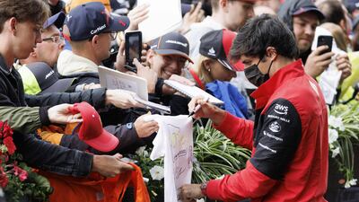Ferrari driver Carlos Sainz Jr signs autographs at the Styrian Green Carpet near the Red Bull Ring. AFP