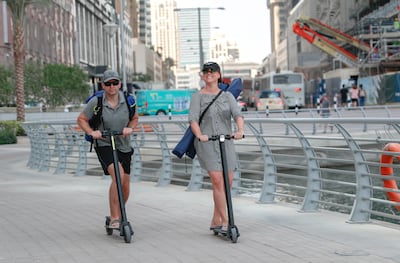 The dawn of e-scooters has posed new challenges for transportation regulators. Victor Besa / The National