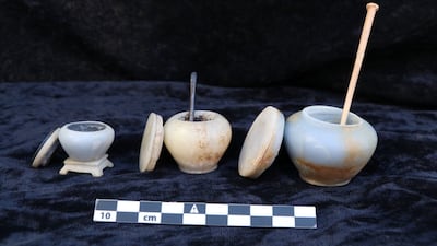 These alabaster cosmetic jars with lids and applicators, discovered in the tombs’ courtyard, were possibly used for kohl or cosmetic preparations. Photo: Ministry of Tourism and Antiquities.