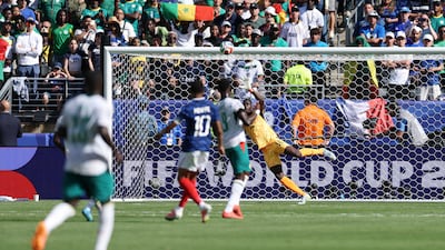 France's Kylian Mbappe scores their third goal against Senegal in New York. Reuters