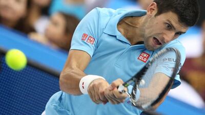 Novak Djokovic helps the UAE Royals to a win against Micromax Indian Aces player Gael Monfils in their International Premier Tennis League match at Hamdan bin Mohammed bin Rashid Sports Complex in Dubai. Ali Haider / EPA
