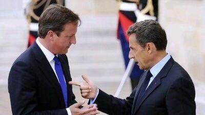 David Cameron, left, the British prime minister and Nicolas Sarkozy, the French president, have had their differences. Miguel Medina / AFP