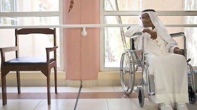 IF, 75, relaxes in the hallway at the Old People's Home in Ajman.
