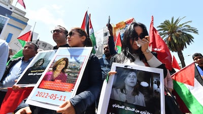 A protest takes place outside the SNJT national journalists' union in Tunis, after the death of Al Jazeera journalist Shireen Abu Akleh, 51, who was shot dead while reporting on armed clashes in the West Bank. AFP