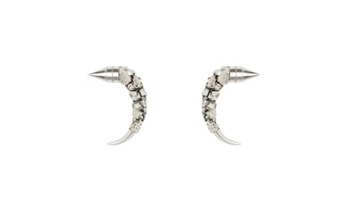 Earrings: Dh1,460, Givenchy. Photo by Ricardo Tisci / Givenchy