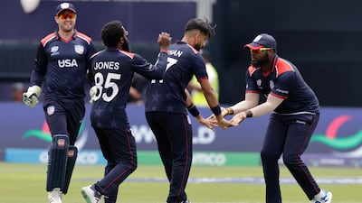 United States' Muhammad Ali-Khan, second right, celebrates with teammates after the dismissal of India batter Rishabh Pant. AP